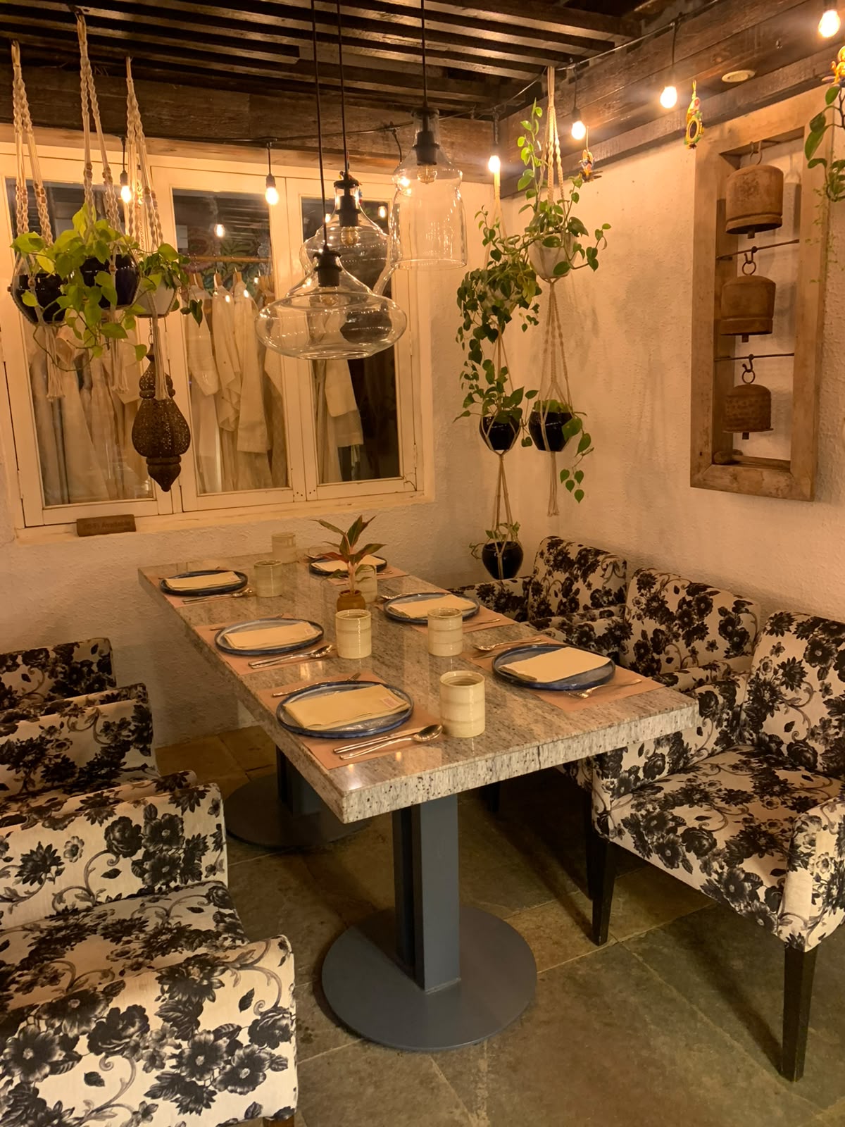 Paashh intimate booth setup with hanging plants