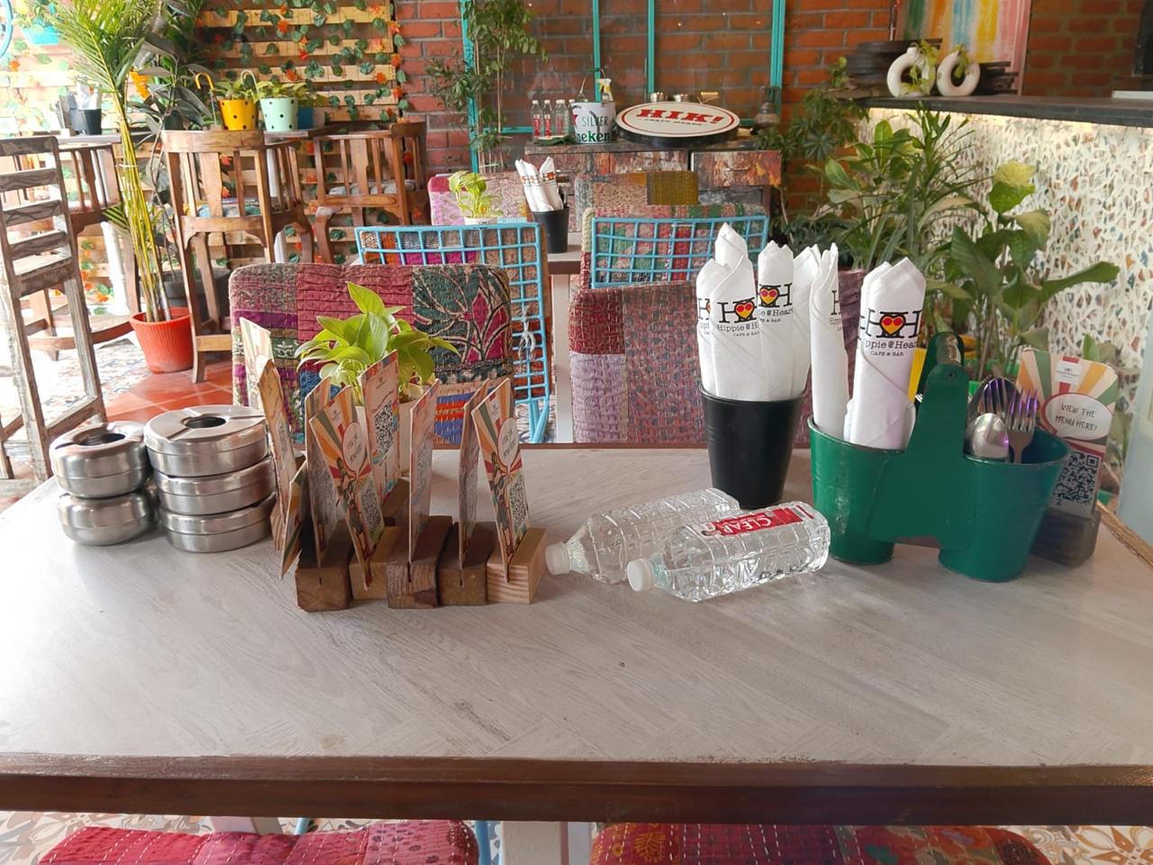 Café table with branded cloth napkins