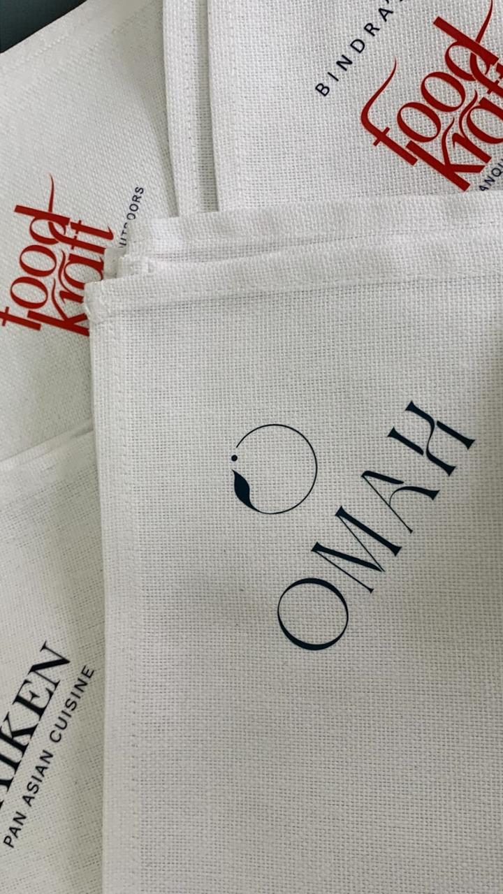 Detail of Omah branded cloth napkin